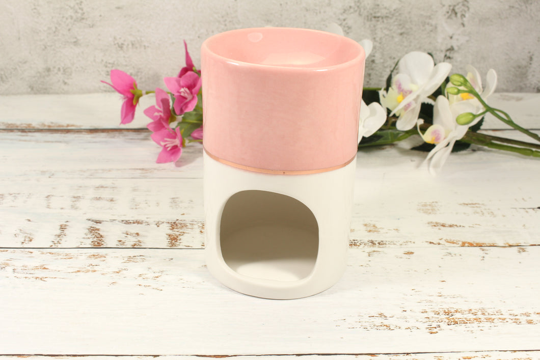 Tall Rose Pink Ceramic Wax burner and a pack of diamonds.